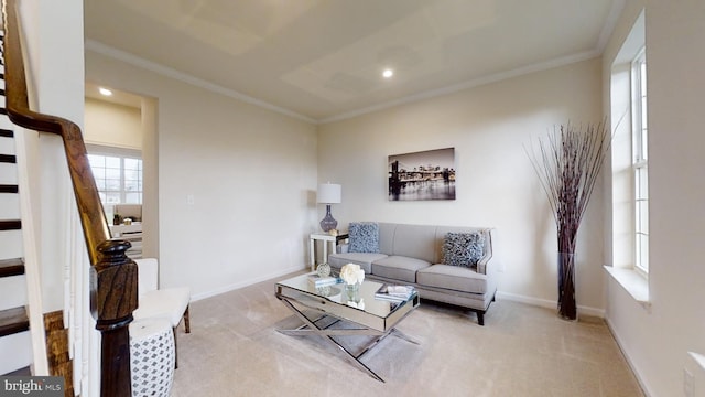 carpeted living room with crown molding