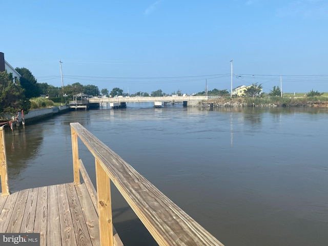 view of dock with a water view