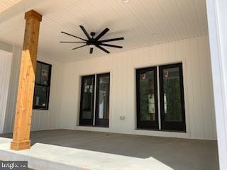 exterior space featuring ceiling fan