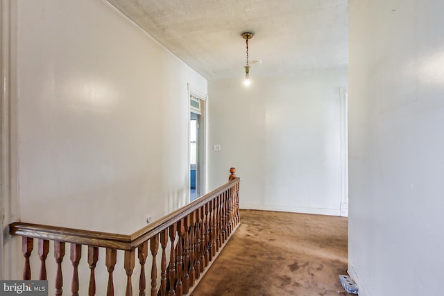 hallway with carpet