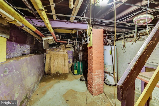 basement with brick wall and gas water heater