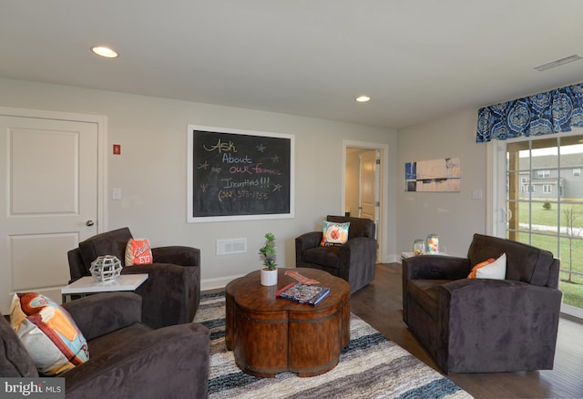 living room with dark wood-type flooring