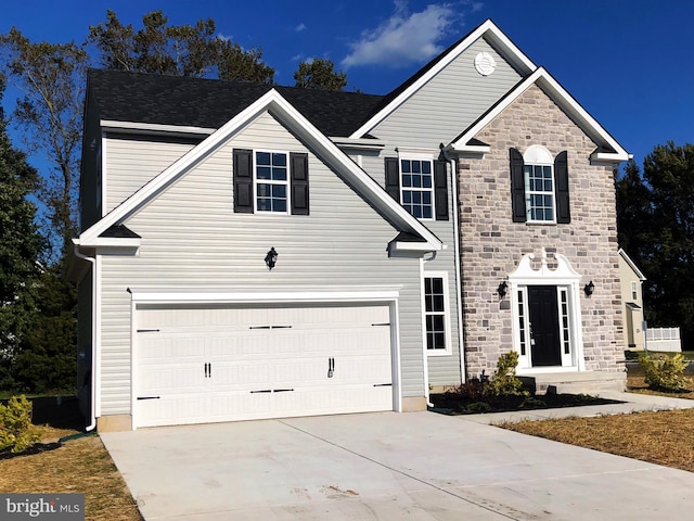 view of front of home with a garage