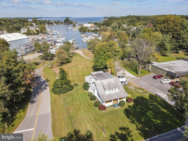 birds eye view of property featuring a water view