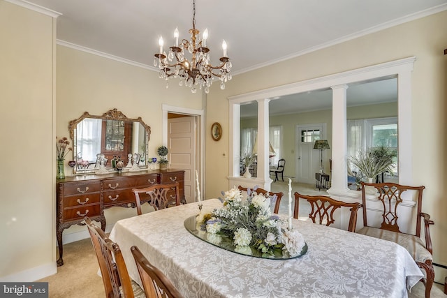 dining area with an inviting chandelier, ornate columns, light colored carpet, and plenty of natural light