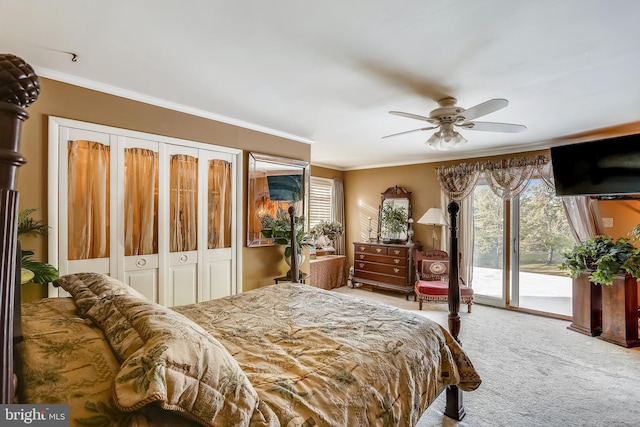 carpeted bedroom featuring ceiling fan, ornamental molding, and access to exterior