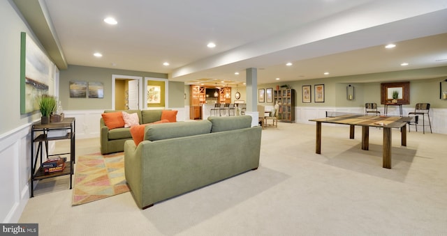 living room featuring light colored carpet