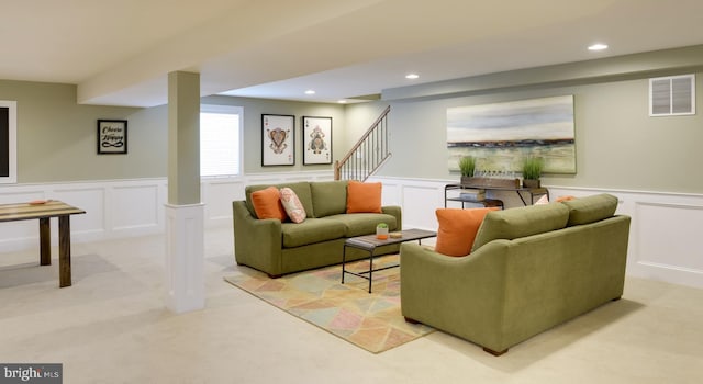 living room featuring light colored carpet