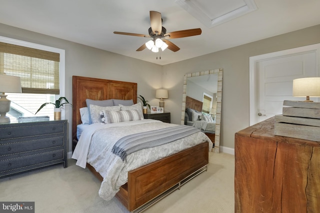 carpeted bedroom with ceiling fan