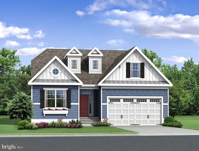 view of front of house featuring a front yard and a garage