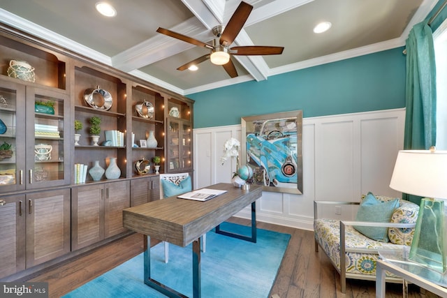 home office featuring dark wood-type flooring, ceiling fan, and crown molding