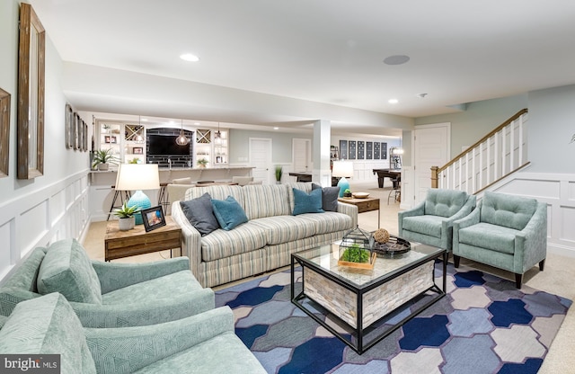 living room featuring light colored carpet