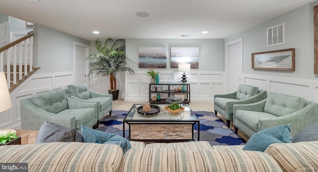 living room featuring light colored carpet