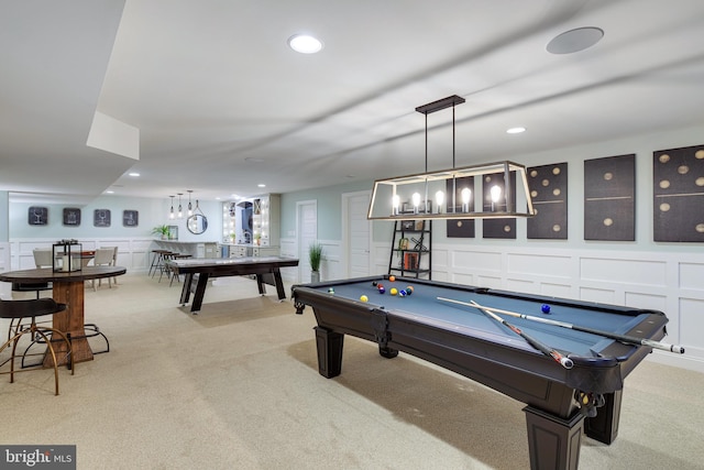 playroom featuring light carpet, billiards, and indoor bar