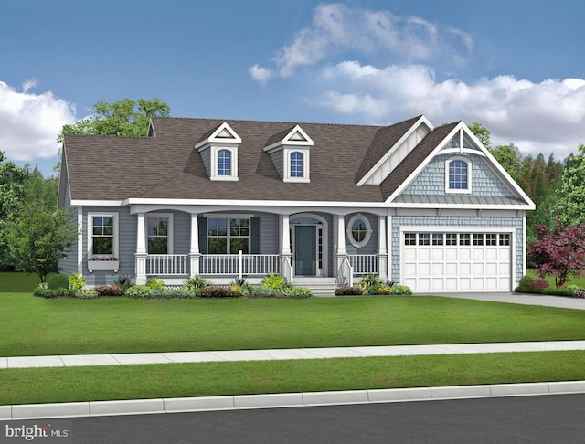 view of front of home featuring a porch, a front yard, and a garage