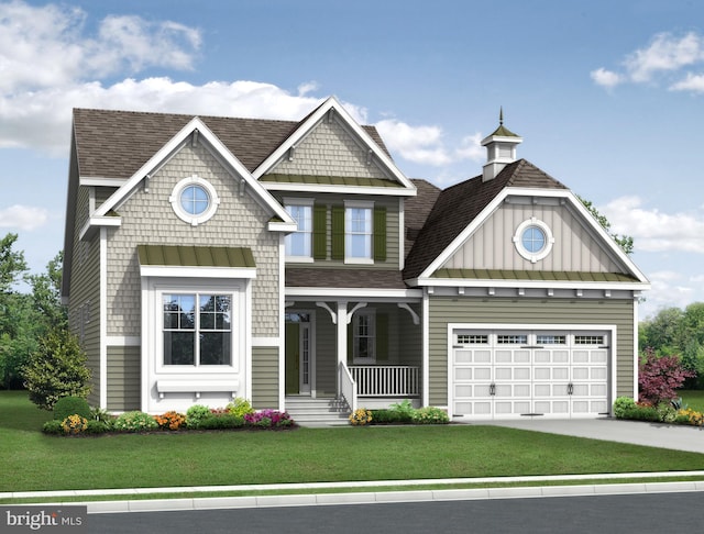 craftsman house with covered porch, a front lawn, and a garage