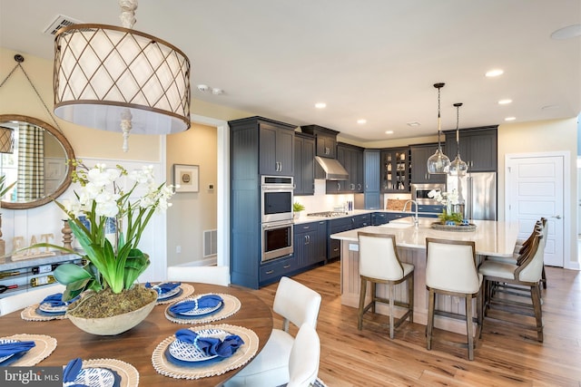 dining area with light hardwood / wood-style flooring