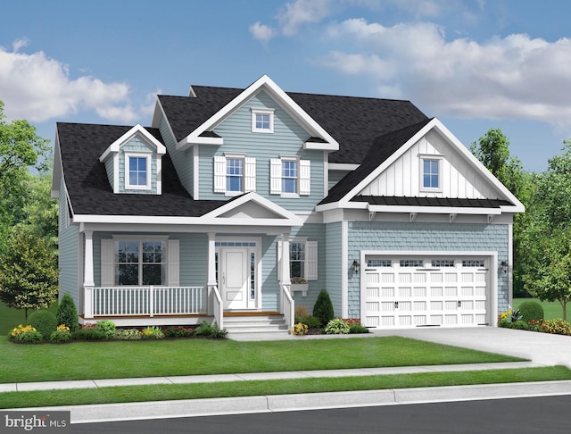 view of front of property featuring a porch, a front yard, and a garage