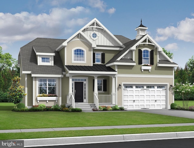 craftsman house featuring a front lawn, covered porch, and a garage