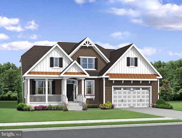 craftsman house with covered porch, a front lawn, and a garage