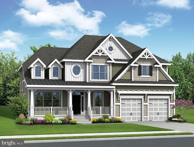 view of front of property with covered porch, a front lawn, and a garage