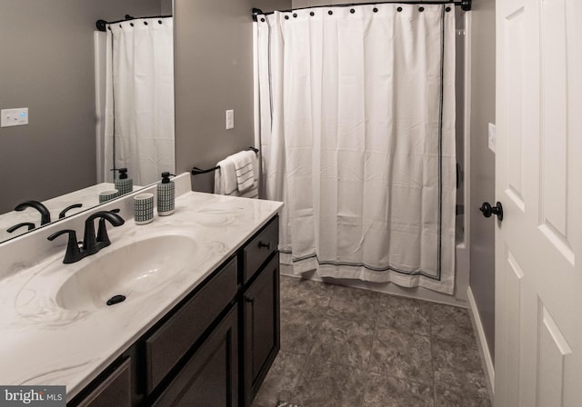 bathroom featuring tile flooring and large vanity