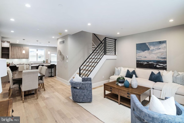 living room featuring light wood-type flooring