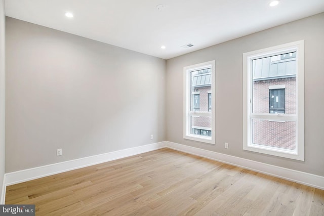 empty room featuring light hardwood / wood-style floors