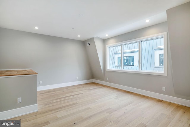 unfurnished room featuring light hardwood / wood-style floors