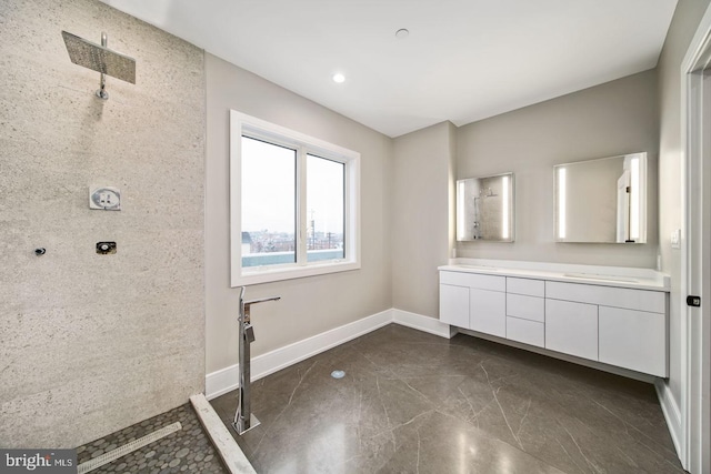 bathroom with vanity and tile floors