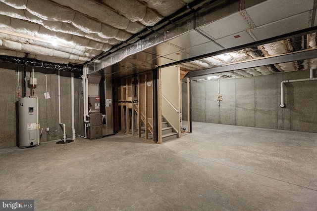 basement with heating utilities and water heater