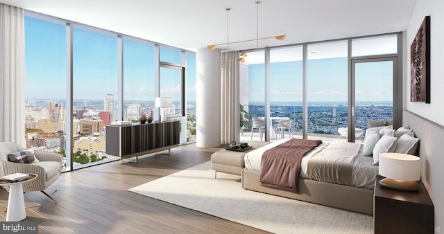 bedroom featuring multiple windows, dark wood-type flooring, and a wall of windows