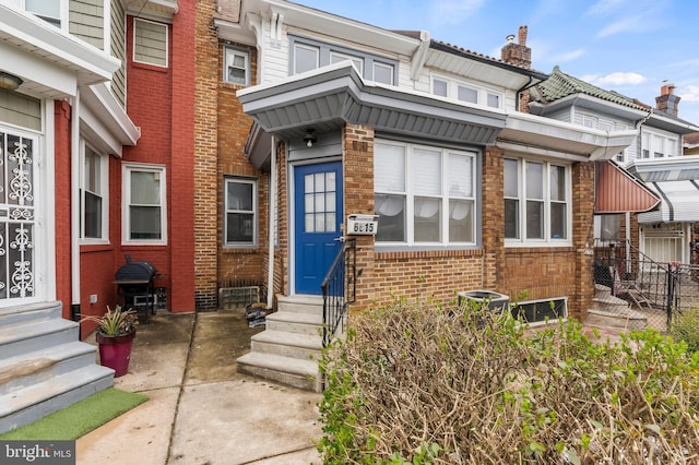 view of front of home featuring central AC unit