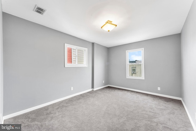 view of carpeted spare room