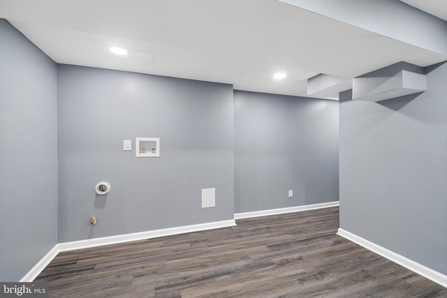 basement featuring dark hardwood / wood-style floors