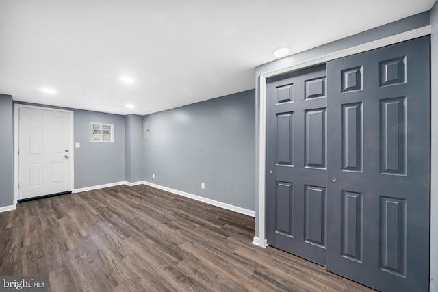 foyer entrance featuring dark hardwood / wood-style floors