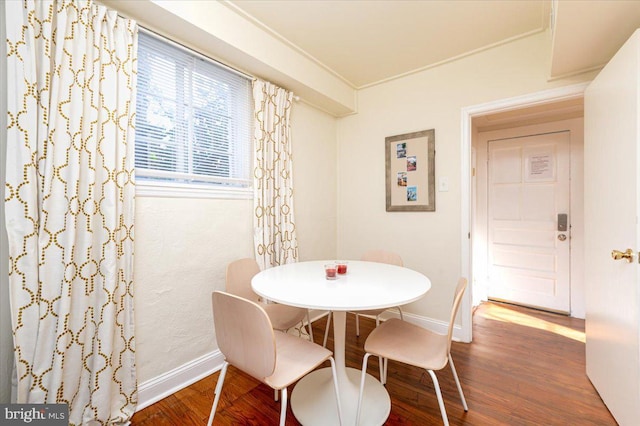 dining room featuring dark wood-type flooring