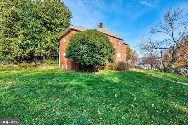 exterior space featuring a lawn