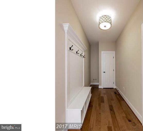 mudroom featuring dark hardwood / wood-style floors