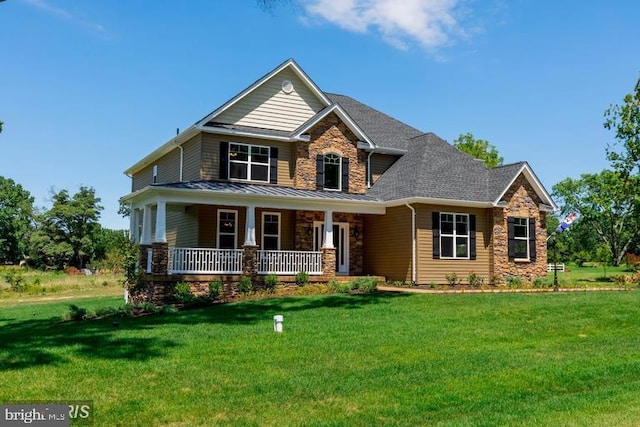 craftsman house featuring a front yard and a porch