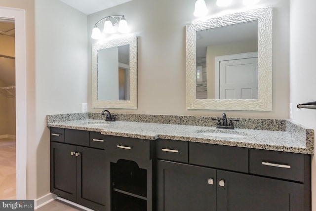 bathroom with dual vanity