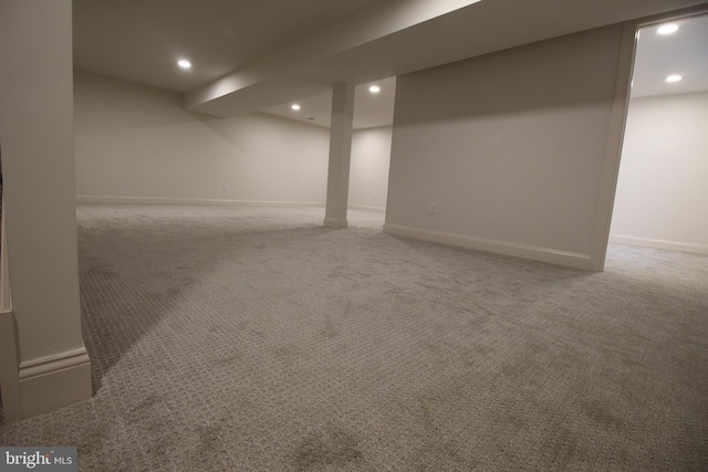 basement featuring carpet flooring