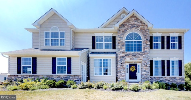 view of front facade with a front yard