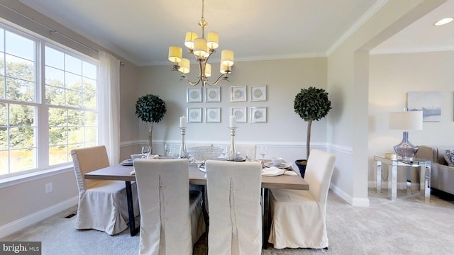 dining space with crown molding, light carpet, and a chandelier