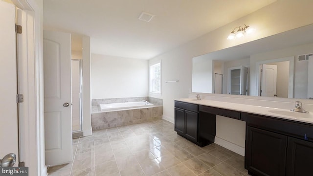 bathroom with dual sinks, separate shower and tub, tile floors, and large vanity