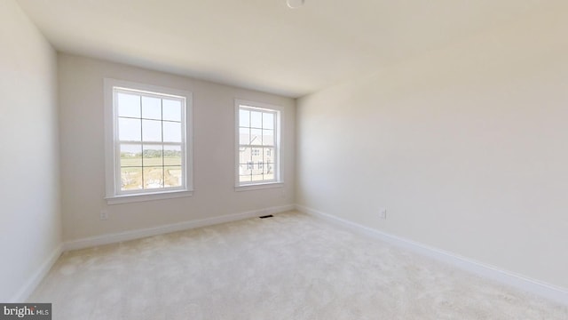 view of carpeted spare room