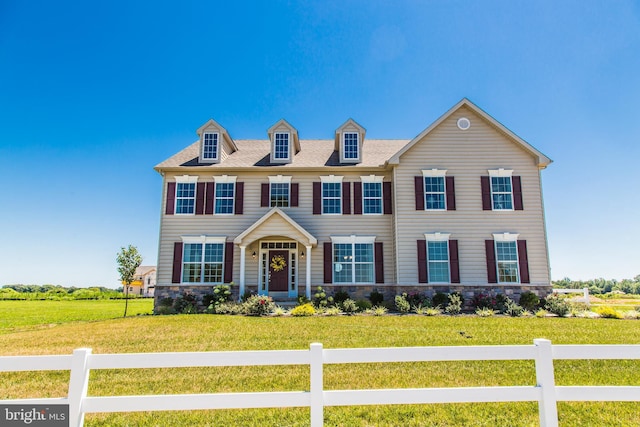 view of front of property with a front lawn