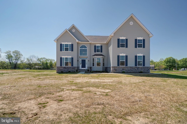 view of front of house with a front yard