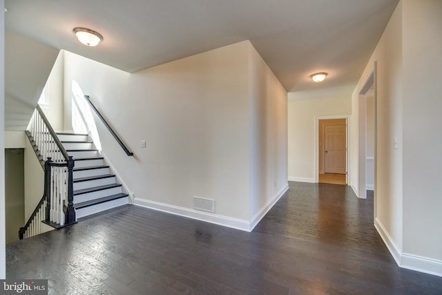 interior space featuring dark wood-type flooring