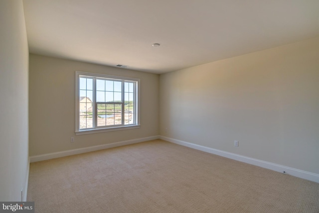 view of carpeted spare room